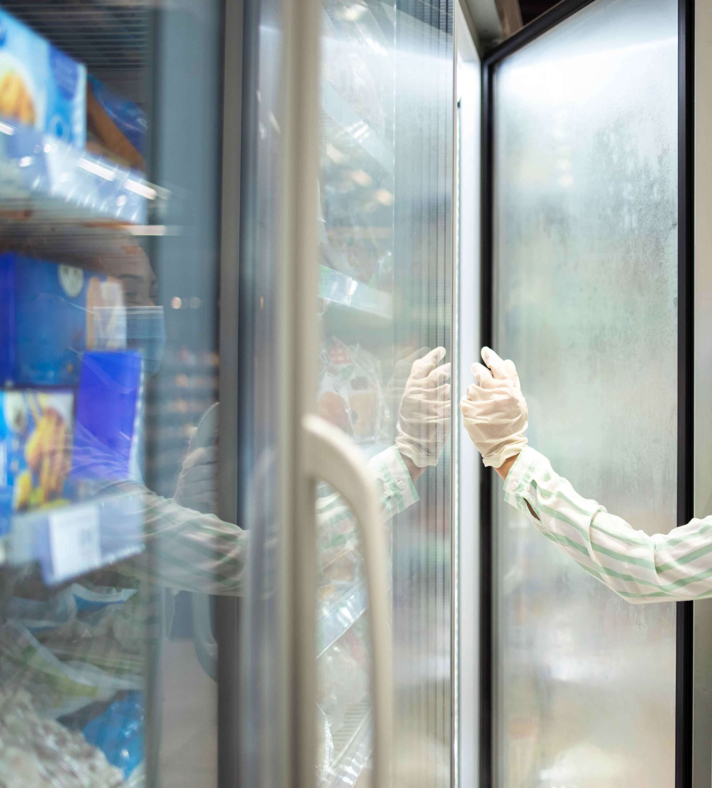 woman wearing protective mask gloves buying groceries food